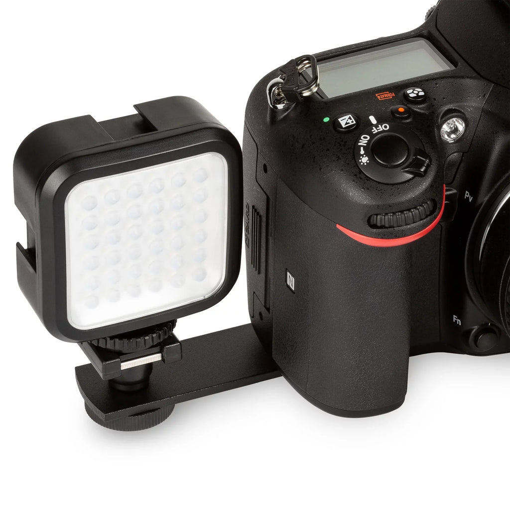 Z50 Mirrorless Camera with NIKKOR Z 24-70mm f/4 S Lens, SanDisk 32GB Memory Card, Backpack, Flash, Tripod and ZeeTech Accessory Bundle